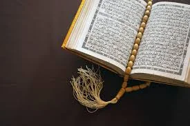 when was the Holy Quran written